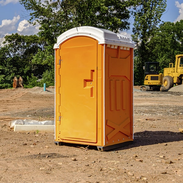 what is the cost difference between standard and deluxe portable restroom rentals in Buckhart